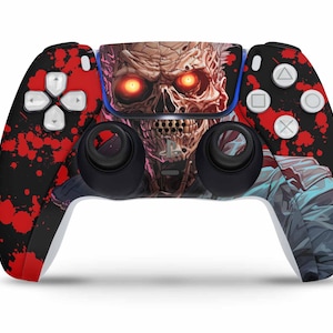 Könnte beinhalten: Ein schwarzer und roter PlayStation 5-Controller mit einem Schädel- und Blutfleckendesign. Der Controller hat eine weiße Frontplatte mit einem Schädel-Motiv und roten Blutflecken auf der Rückseite.
