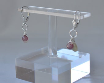 Pink on pink sapphires on a silver lever back