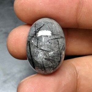 Verbazingwekkende topkwaliteit natuurlijke zwarte rutielkwarts. Cabochon Ovale Vorm Losse Edelsteen Hand gepolijste sieraden maken 22X16 MM, 27.00Carts.