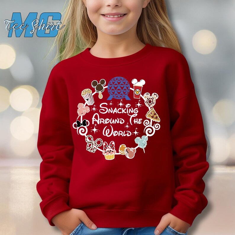 May include: Red sweatshirt with a white graphic of Mickey Mouse and other Disney characters. The graphic says "Snacking Around the World".