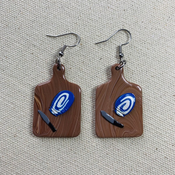 Blue skies and fluffy white clouds chopping board earrings