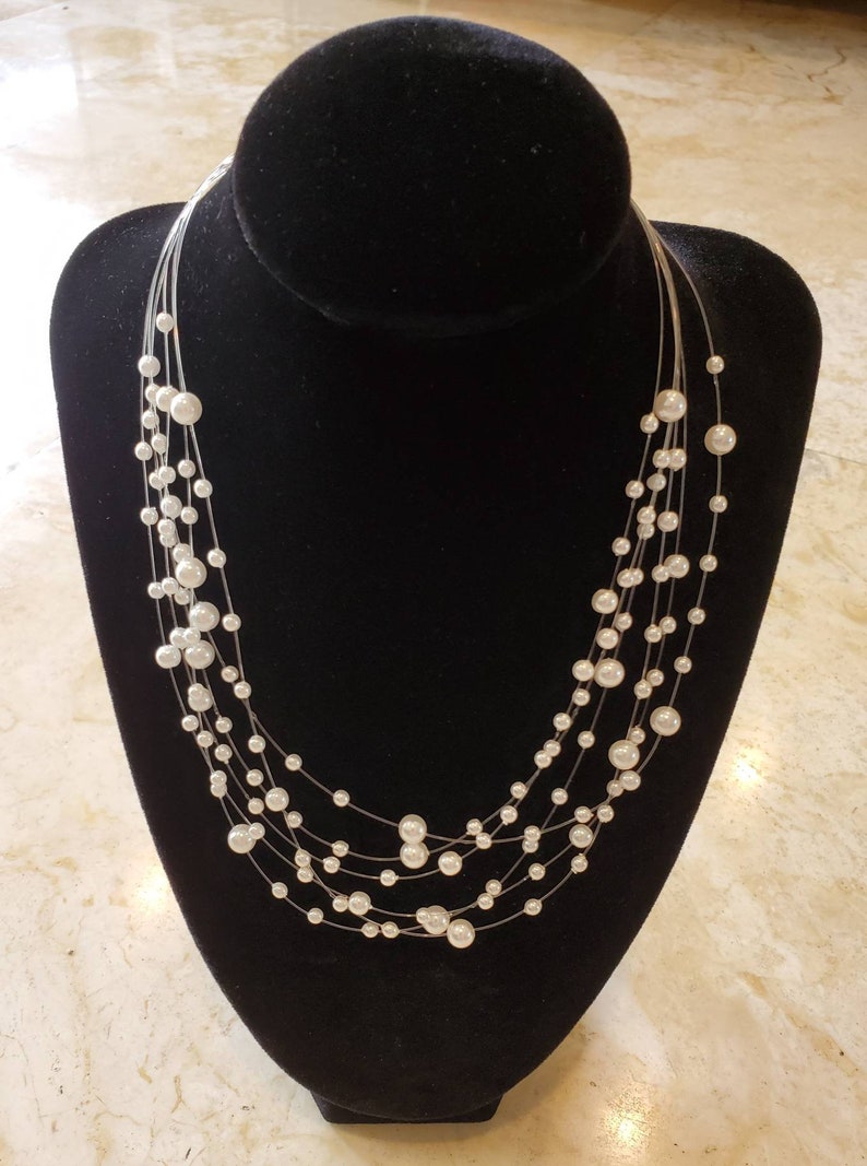 Set of White Pearl Necklace and Earrings