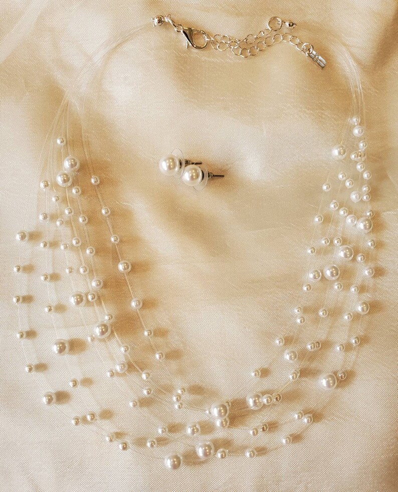 Set of White Pearl Necklace and Earrings