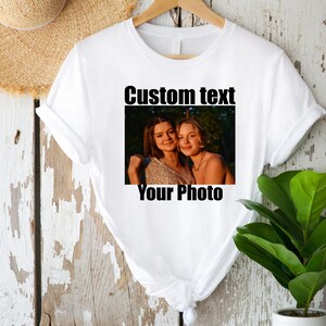 a t - shirt with a picture of two women on it