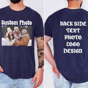 May include: A navy blue t-shirt featuring a custom photo print on the front with the text Custom Photo above it. The back of the shirt displays the white text BACK SIDE TEXT PHOTO LOGO DESIGN. The shirt is shown from both front and back views.