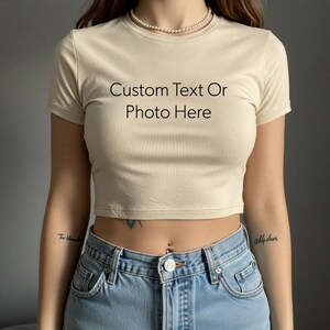 a woman wearing a t - shirt that says custom text or photo here