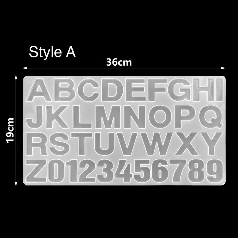 May include: A clear silicone mold for making letters and numbers. The mold is 36 cm wide and 19 cm tall. The mold includes the letters A through Z and the numbers 0 through 9.