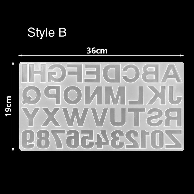 May include: A clear silicone mold with the letters of the alphabet and numbers 0-9. The mold is 36 cm wide and 19 cm tall. Style B.