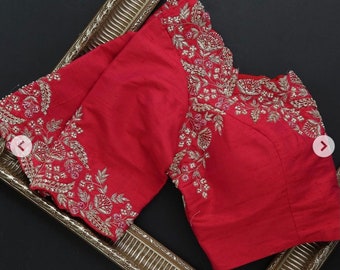 dark orange maggam work blouse with silver zari work