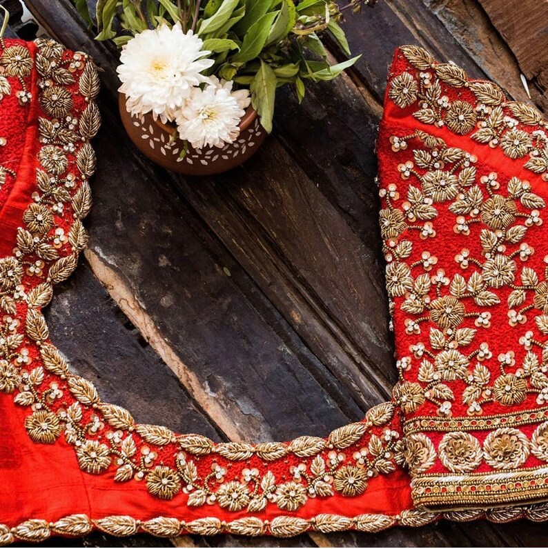 Raw silk Orange Maggam work blouse with zari and stone work image 2