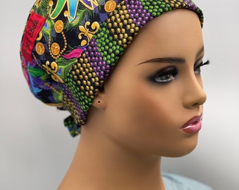 Snazzy Mardi Gras scrub cap. Join the parade! Louisiana/Jazz.Masks, beads and Feathers. scrub cap. Tie back.
