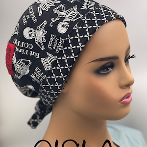 May include: Black and white patterned surgical scrub hat with a skull and crossbones design and the text "But First, Coffee" and "Death Before Decaf".