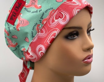 At Your Cervix! In your uterus. Cheeky, Snazzy best selling scrub cap.Regular Size/ short hair size.Great group gift.