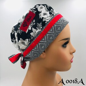 It’s Black & White with a pop of red -scrub caps. Regular Size.