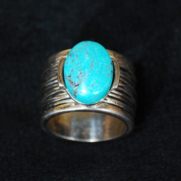 FAUX TURQUOISE RING on a Wide Silvertone Band.