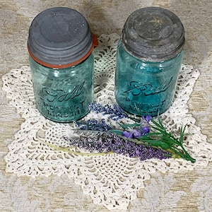 Farmhouse Decor with Two Collectible Blue Mason Jars with Zinc Lids and a Hand Crocheted Doily