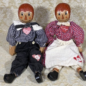 Vintage Pair of Folk Art Wooden Dolls Handmade of Solid Wood, Cloth, and Cotton.