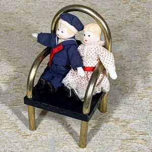 Two Vintage Russ Berrie Miniature Dolls in a Chair