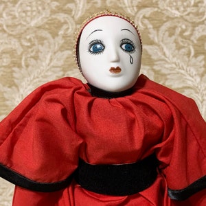 Bisque Porcelain French Pierrot Clown in Red with Black and Gold Trim