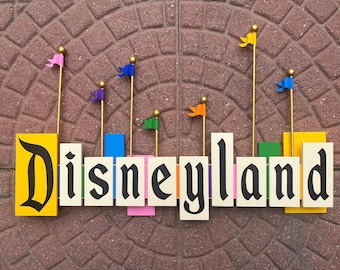 Vintage Disneyland Entrance Sign With Flags