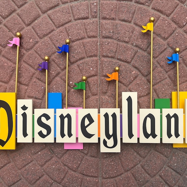 Vintage Disneyland Entrance Sign With Flags