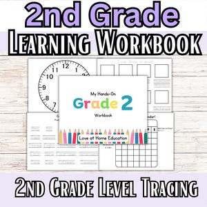 May include: A colorful workbook titled "My Hands-On Grade 2 Workbook" with the text "Love at Home Education" below. The workbook includes a clock, a calendar, and tracing activities for second grade.