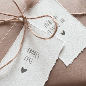 Set di 4 etichette regalo "White Christmas" - 4 motivi diversi | Bianco/antracite, con elegante bordo rialzato | Natale, imballaggio