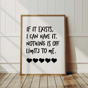 May include: A framed print with a white background and black text that reads "IF IT EXISTS, I CAN HAVE IT. NOTHING IS OFF LIMITS TO ME." There are five black hearts at the bottom of the print.