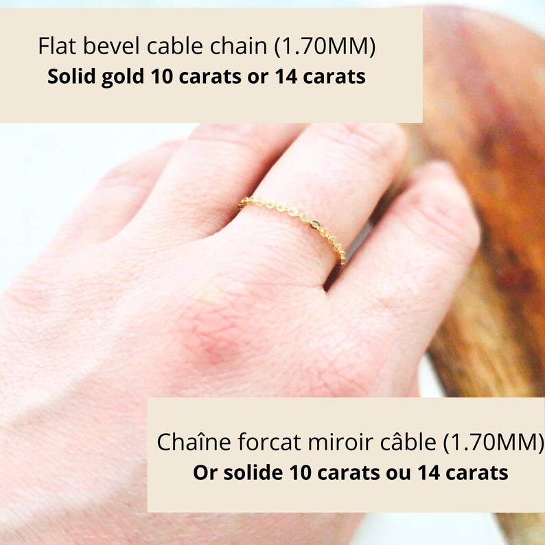 May include: A close-up of a gold flat bevel cable chain ring. The ring is made of solid gold and is 1.70MM in width. The text in the image reads "Flat bevel cable chain (1.70MM) Solid gold 10 carats or 14 carats."