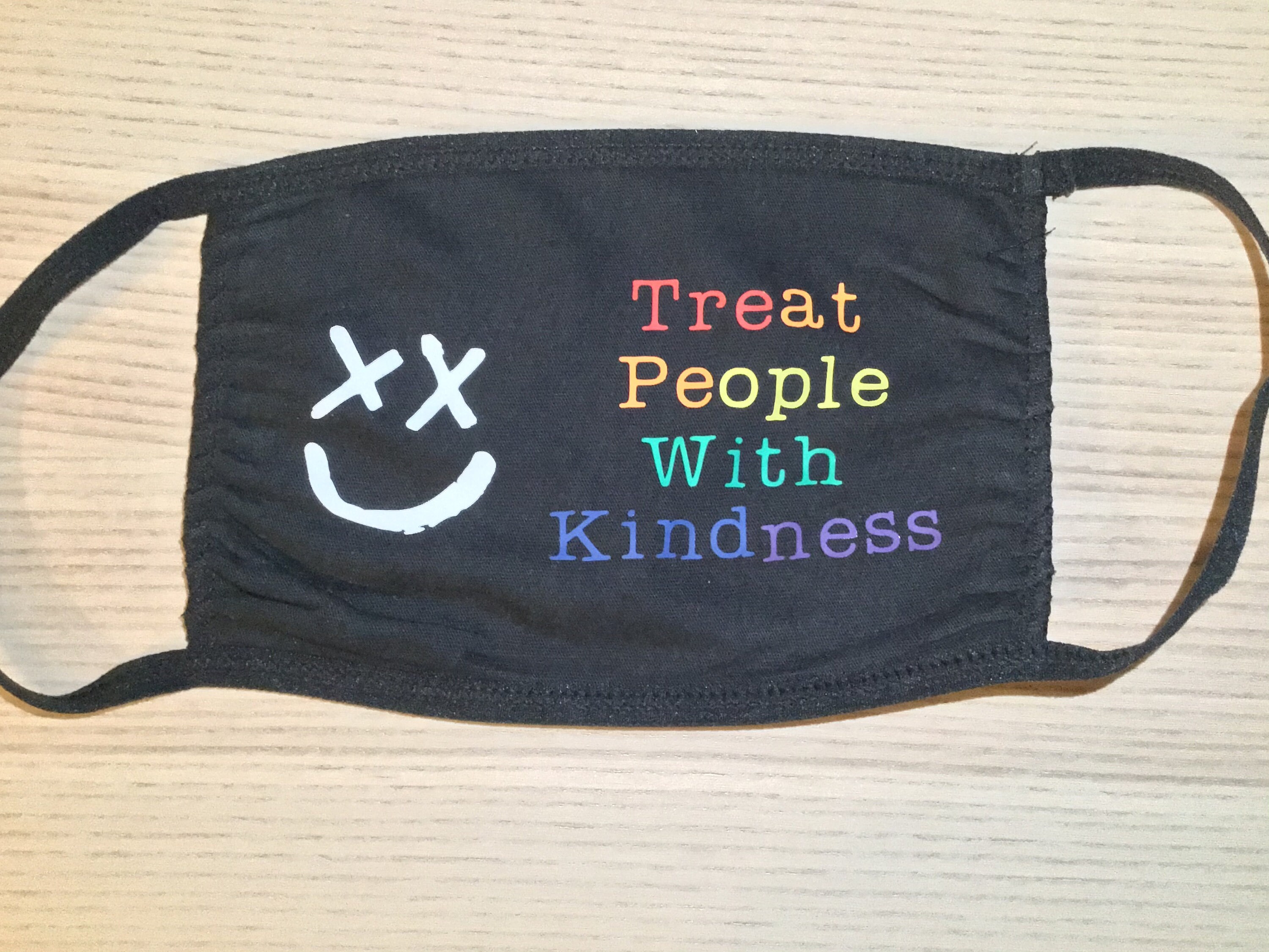 Treat People with Kindness Smiley washable cotton face mask.