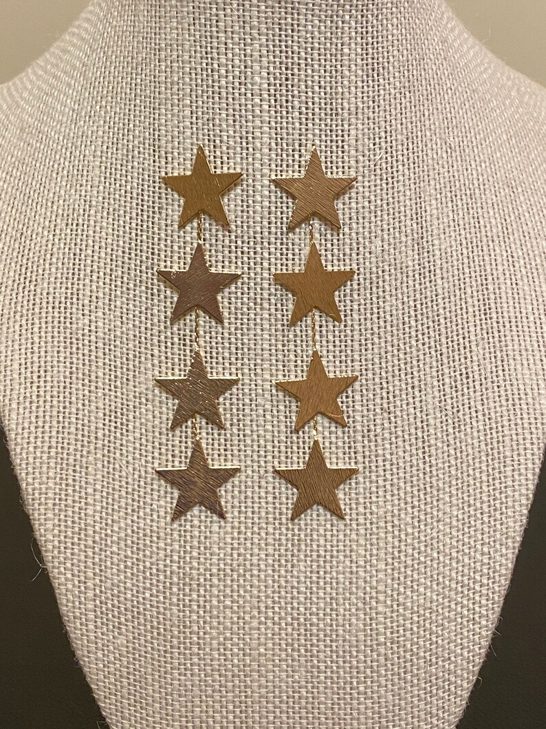 4 star gold earrings
