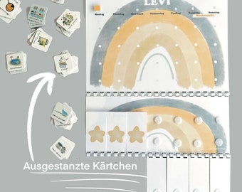 May include: A colorful rainbow chart with a name "LEVI" at the top. The chart has days of the week listed across the top and a rainbow with white dots on each arc. Below the chart are white cards with stars and white dots. The text "Ausgestanzte Kärtchen" is at the bottom of the image.