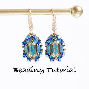May include: A pair of beaded earrings with a turquoise and blue color scheme. The earrings have a rectangular center stone surrounded by smaller blue beads and gold accents. The text "Beading Tutorial" is displayed below the earrings.