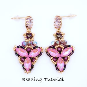 May include: A pair of pink and purple beaded earrings with gold accents. The earrings are teardrop shaped and feature a flower design. The earrings are hanging from gold ear wires.