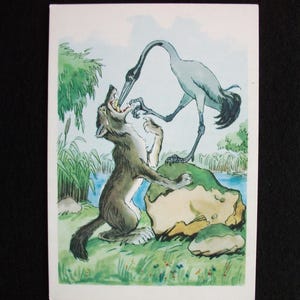 May include: A vintage illustration depicts a wolf with its mouth open, being attended to by a crane. The crane, with its long beak, is reaching into the wolf's mouth. The scene is set in a grassy area with a pond and trees in the background.