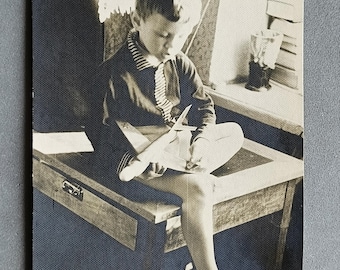 Barefoot Boy sitting on table Holding Airplane Vintage photo Children Kids