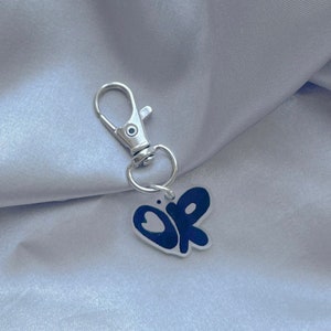 Olivia Rodrigo Logo Keychain