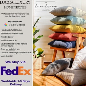 May include: A stack of 6 decorative throw pillows in various colors, including blue, green, yellow, red, and gray. The pillows are arranged on a wooden chair with a white background. The pillows are made of a textured fabric and have a subtle sheen. The text "THE lucca luxury COLLECTION" is visible in the top right corner of the image.