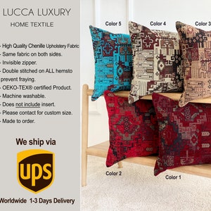 May include: A selection of patterned throw cushions in shades of teal, red, and brown, arranged on a wooden shelf. The cushions feature geometric designs. The image also includes the text "LUCCA LUXURY HOME TEXTILE".
