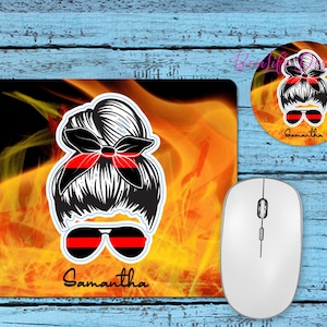 May include: A mouse pad with a fire design and a woman's face with a red bandana and sunglasses. The text "Samantha" is printed on the mouse pad.