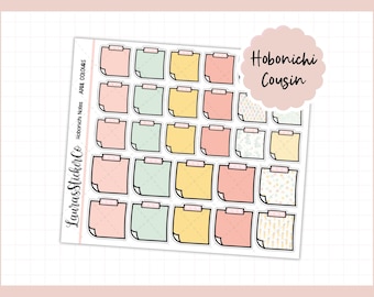 May include: A sheet of stickers featuring colorful sticky notes in pastel shades of pink, green, and yellow. Each note has a silver clip at the top. The stickers are labeled "Hobonichi Cousin" and "April Colours."