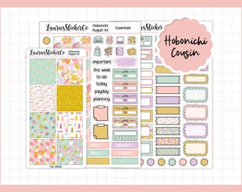 May include: A collection of planner stickers with a floral theme. The stickers include full boxes, functional labels, and decorative elements in pastel colors. The text "Hobonichi Cousin" is displayed on a pink scalloped label.