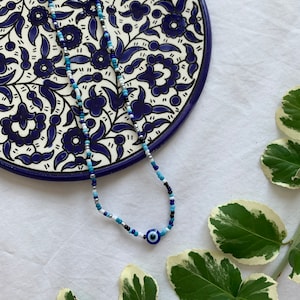 Shades of blue evil eye necklace
