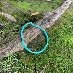 Teal and gold bracelet
