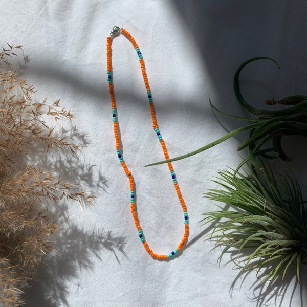 Orange and teal beaded necklace