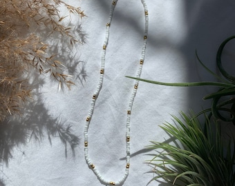 Gold and white beaded necklace