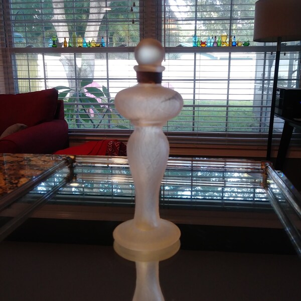 Antique Narcisse perfume bottle.  Frosted figural glass bottle with round stopper.