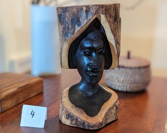 Small Makonde carving of head using African Blackwood with bark preserved
