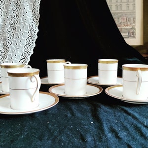 Set of 6 coffee cups and saucers by Royal Doulton Royal Gold