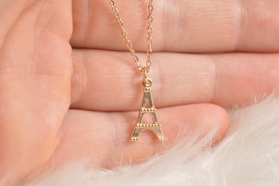 0.1 CT. T.W. Natural Diamond Heart Online Eiffel Tower Pendant in Ster –  Goldia.com